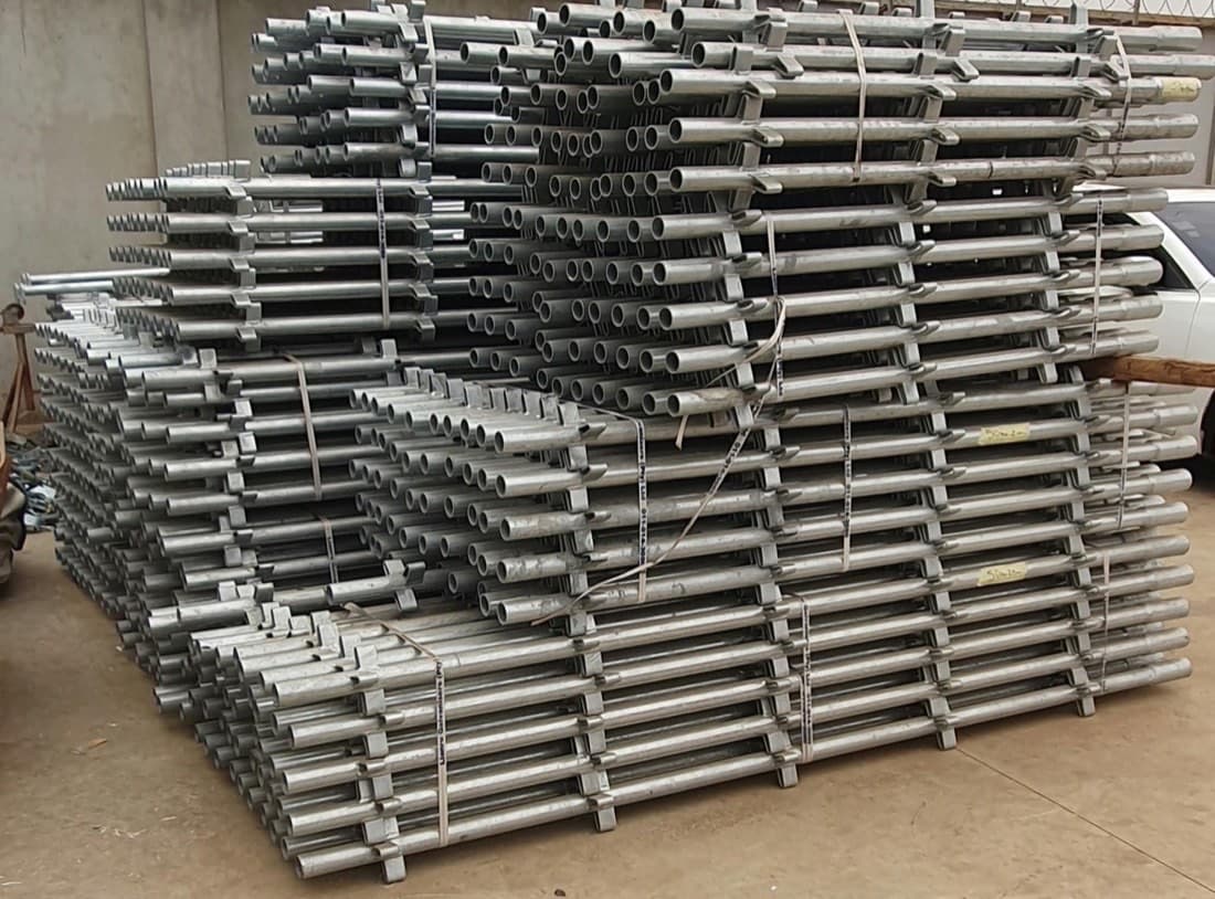 Galvanised scaffolding stock banded and stacked at the Petrowork yard