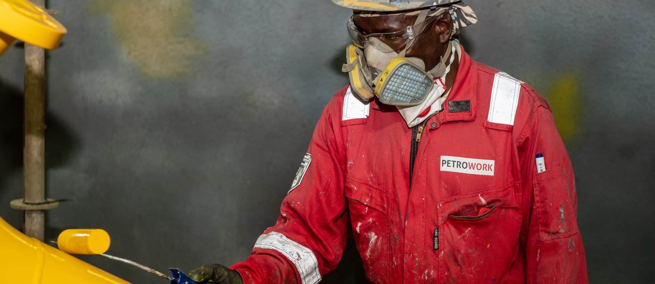 Technician inspecting a freshly coated component